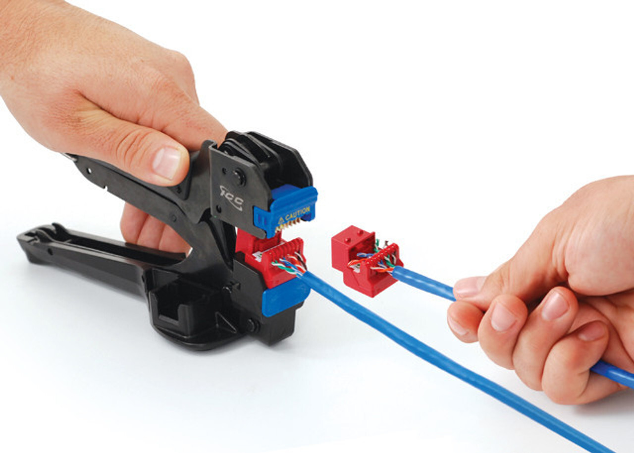 Image of someone using a 4-pair punch-down tool to terminate a Cat 6 jack.