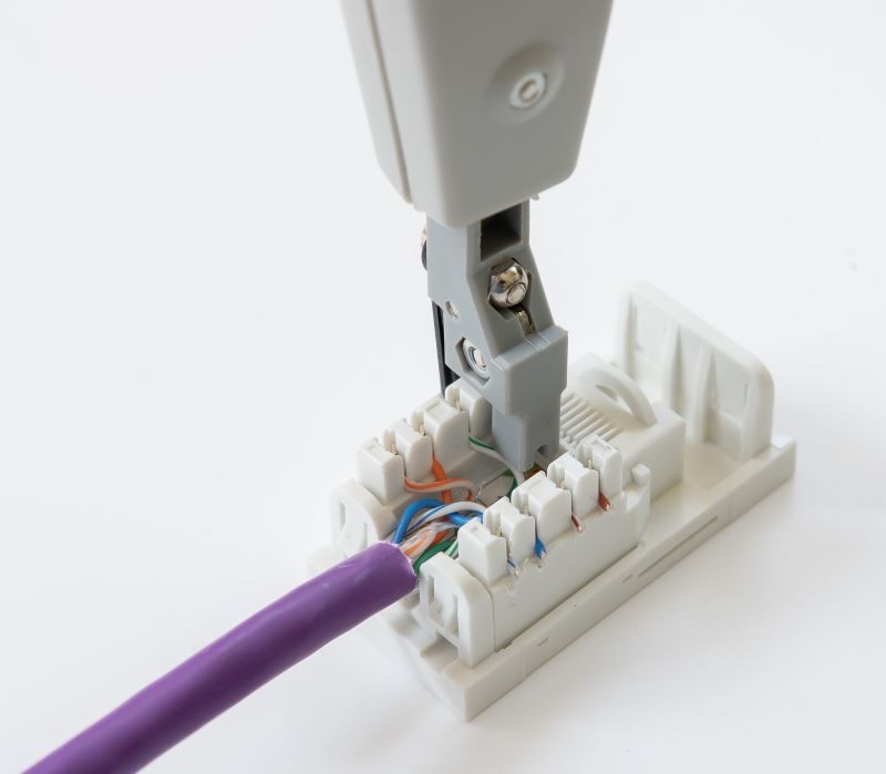 Close up of the IDC's on a network jack.